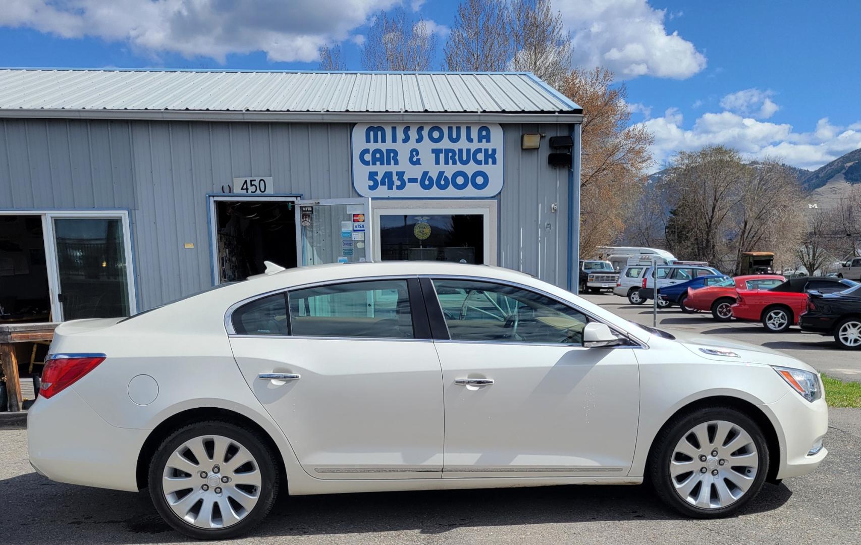 2014 Pearl White /Brown Buick LaCrosse PREMIUM (1G4GE5G33EF) with an 3.6L V6 engine, 6 Speed Auto transmission, located at 450 N Russell, Missoula, MT, 59801, (406) 543-6600, 46.874496, -114.017433 - Beautiful AWD Luxury Sedan. 3.6L V6 Engine. 6 Speed Automatic Transmission. Power Sunroof. Leather Heated Seats. Bluetooth. Memory Seats. Air. Cruise. Tilt. Power Windows and Locks. AM FM XM CD. Bose Sound. Remote Start. Adaptive Cruise Control. - Photo#0